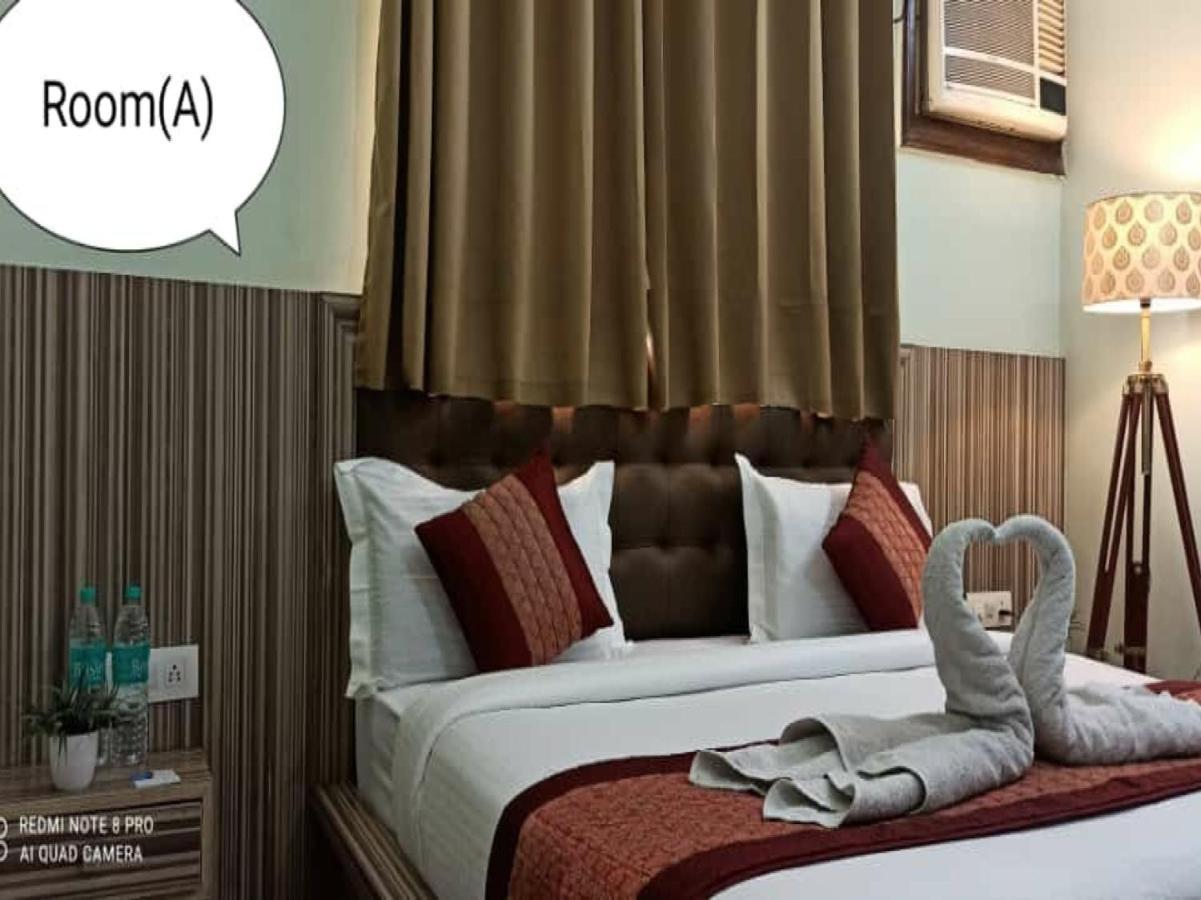 Oyo 74401 Aster Garden Suites Дели Экстерьер фото